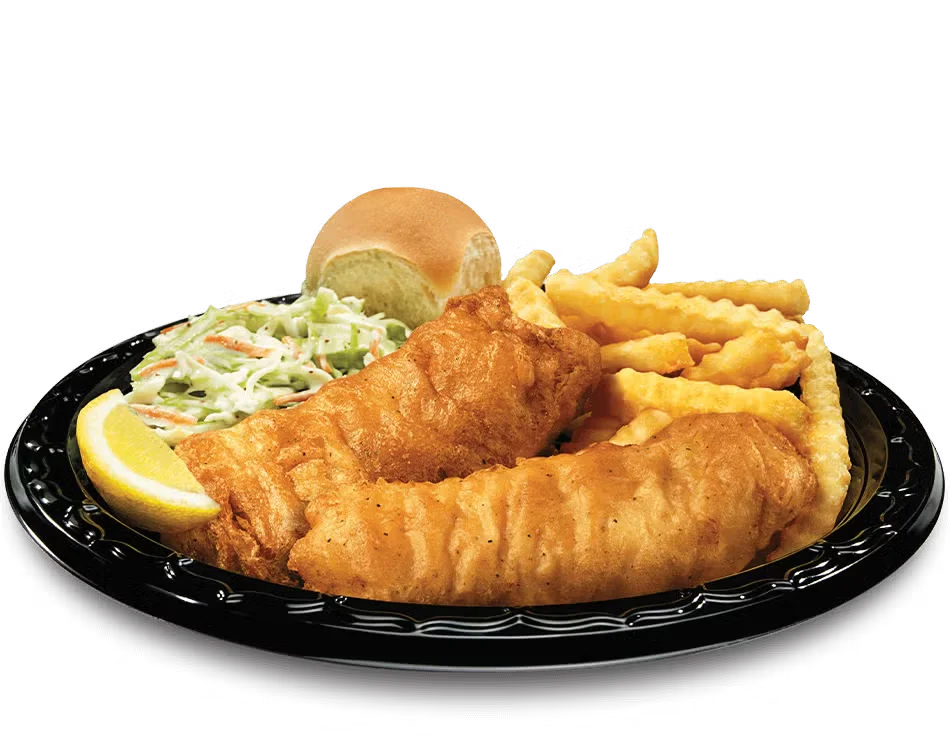 Culver’s North Atlantic Cod Dinner with golden fried cod, tartar sauce, fries, and a dinner roll on a plate