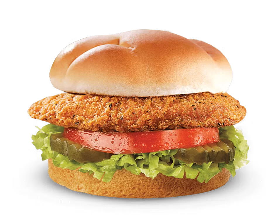 Culver’s Spicy Crispy Chicken Sandwich with lettuce and pickles on a toasted bun, golden and bold