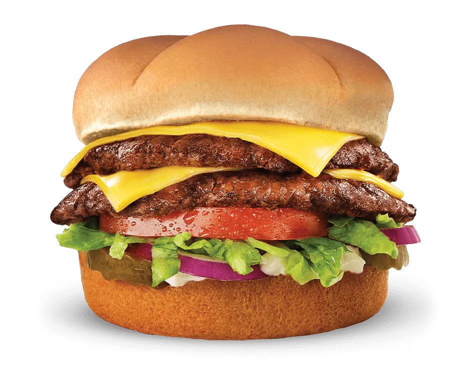 The Culver’s® Deluxe ButterBurger with cheese, lettuce, tomato, pickles, red onion, and mayo on a lightly buttered bun
